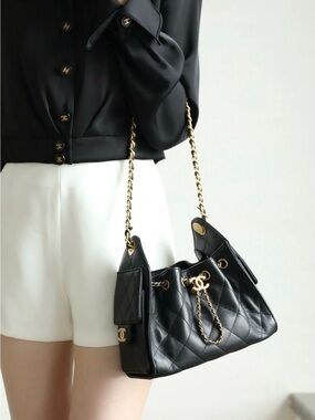 CHANEL 25 Mini Black Quilted Drawstring Shoulder Bag w/ Brushes Gold
CC Hardware